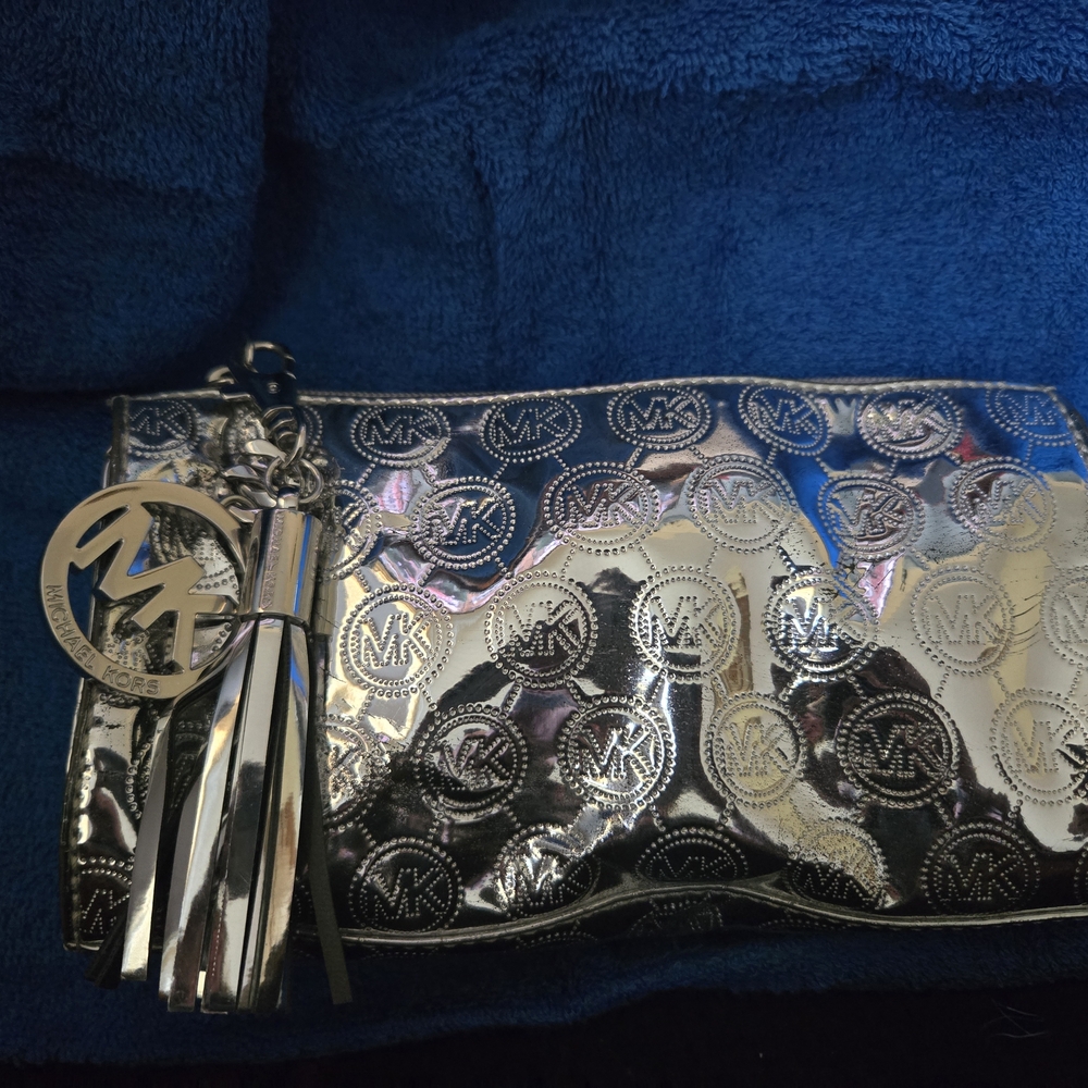 Michael Kors Silver Clutch with Logo Design